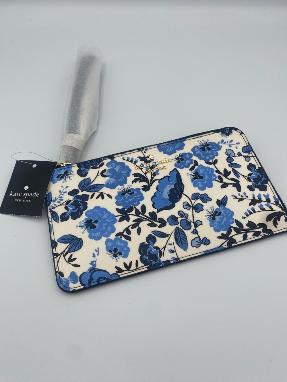 Kate Spade White floral zip wallet with blue and black blooms